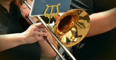howto play the trombone quietly